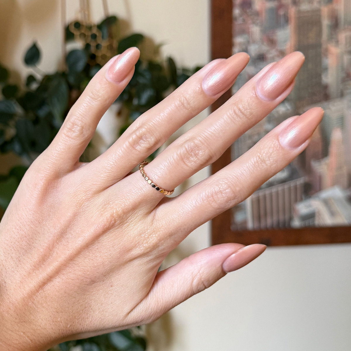Cookie Swap Gel shimmery beige champagne gel polish on natural medium-length nails for a refined manicure by Olive and June