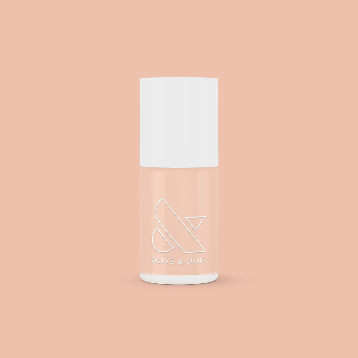 KAG nail polish bottle in neutral peachy pink shade on matching peach background for a fresh mani or pedi